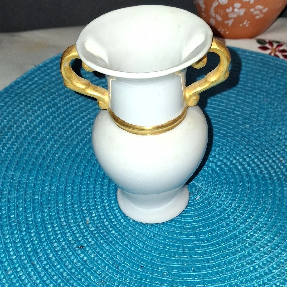 Elegant White Vase with Gold Accents